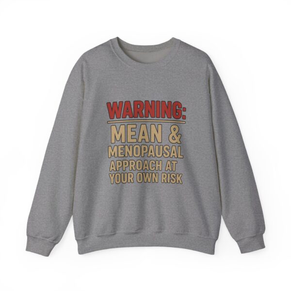 “Warning: Mean and Menopausal – Approach at Your Own Risk” sweatshirt, a cozy and funny statement piece for women embracing perimenopause with humor and attitude.