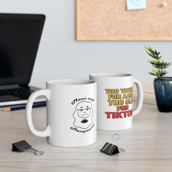 Gen X mug with red and yellow text reading “Too Young for AARP, Too Old for TikTok.”