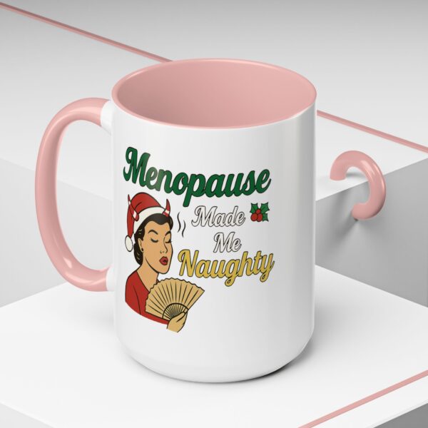 Menopause Made Me Naughty Christmas Mug by Mean and Menopausal — white ceramic holiday mug with colorful interior, retro woman design, and sassy festive quote.