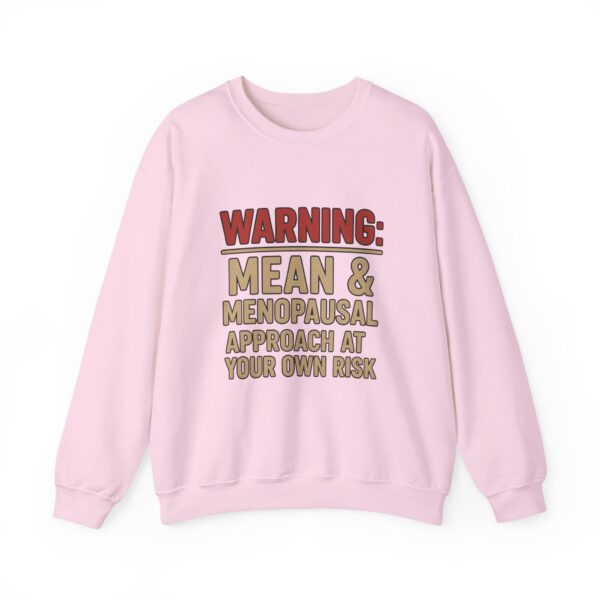 “Warning: Mean and Menopausal – Approach at Your Own Risk” sweatshirt, a cozy and funny statement piece for women embracing perimenopause with humor and attitude.