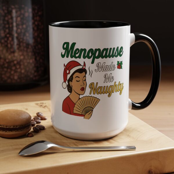 Menopause Made Me Naughty Christmas Mug by Mean and Menopausal — white ceramic holiday mug with colorful interior, retro woman design, and sassy festive quote.