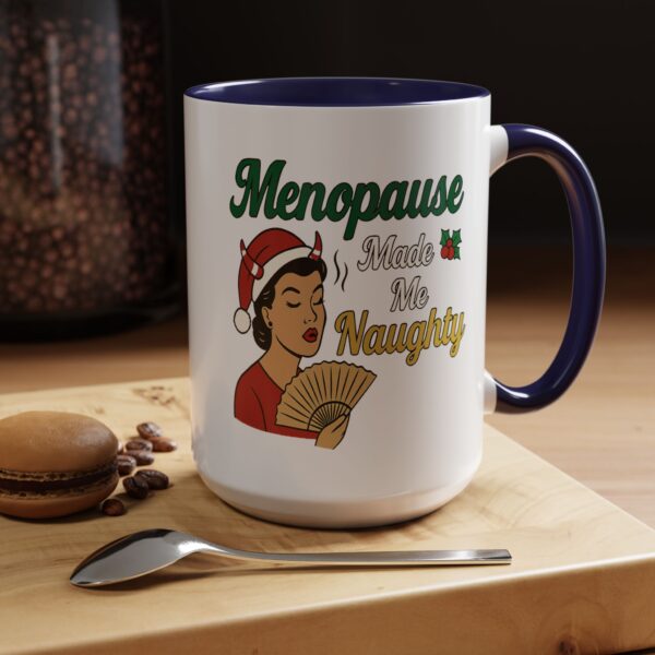Menopause Made Me Naughty Christmas Mug by Mean and Menopausal — white ceramic holiday mug with colorful interior, retro woman design, and sassy festive quote.