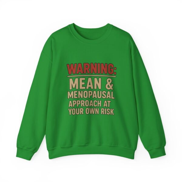 “Warning: Mean and Menopausal – Approach at Your Own Risk” sweatshirt, a cozy and funny statement piece for women embracing perimenopause with humor and attitude.