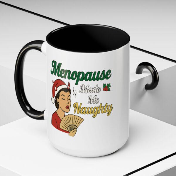 Menopause Made Me Naughty Christmas Mug by Mean and Menopausal — white ceramic holiday mug with colorful interior, retro woman design, and sassy festive quote.