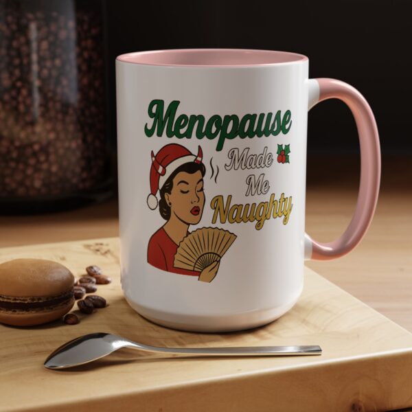 Menopause Made Me Naughty Christmas Mug by Mean and Menopausal — white ceramic holiday mug with colorful interior, retro woman design, and sassy festive quote.