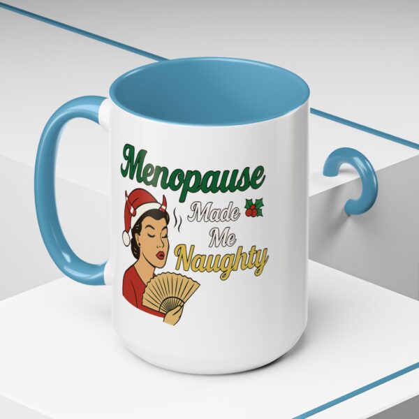 Menopause Made Me Naughty Christmas Mug by Mean and Menopausal — white ceramic holiday mug with colorful interior, retro woman design, and sassy festive quote.