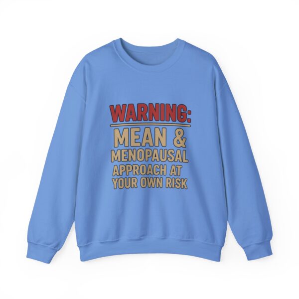 “Warning: Mean and Menopausal – Approach at Your Own Risk” sweatshirt, a cozy and funny statement piece for women embracing perimenopause with humor and attitude.