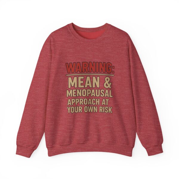“Warning: Mean and Menopausal – Approach at Your Own Risk” sweatshirt, a cozy and funny statement piece for women embracing perimenopause with humor and attitude.