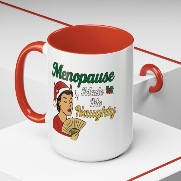 Menopause Made Me Naughty Christmas Mug by Mean and Menopausal — white ceramic holiday mug with colorful interior, retro woman design, and sassy festive quote.