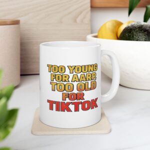 Gen X mug with red and yellow text reading “Too Young for AARP, Too Old for TikTok.”