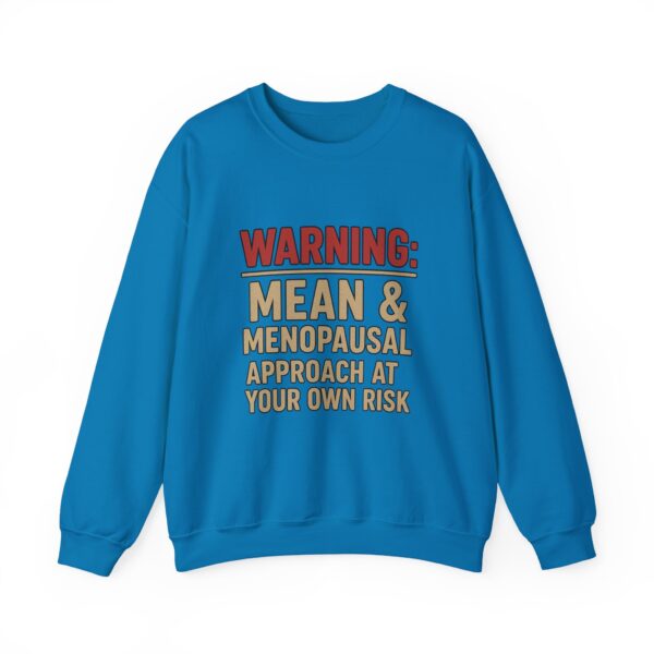“Warning: Mean and Menopausal – Approach at Your Own Risk” sweatshirt, a cozy and funny statement piece for women embracing perimenopause with humor and attitude.