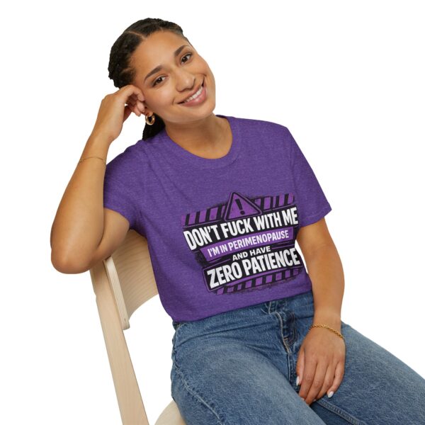 Perimenopause warning t-shirt with bold purple and white graphic and zero patience message