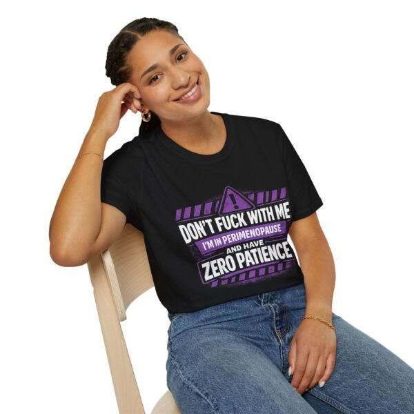 Perimenopause warning t-shirt with bold purple and white graphic and zero patience message